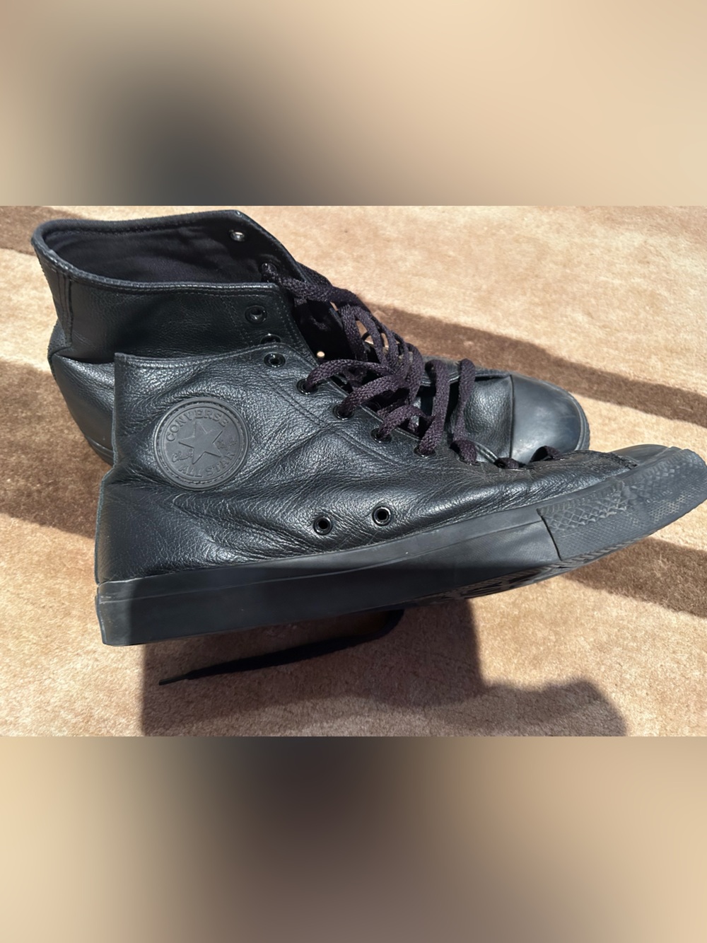 Converse men’s Black High-Top Leather Sneakers